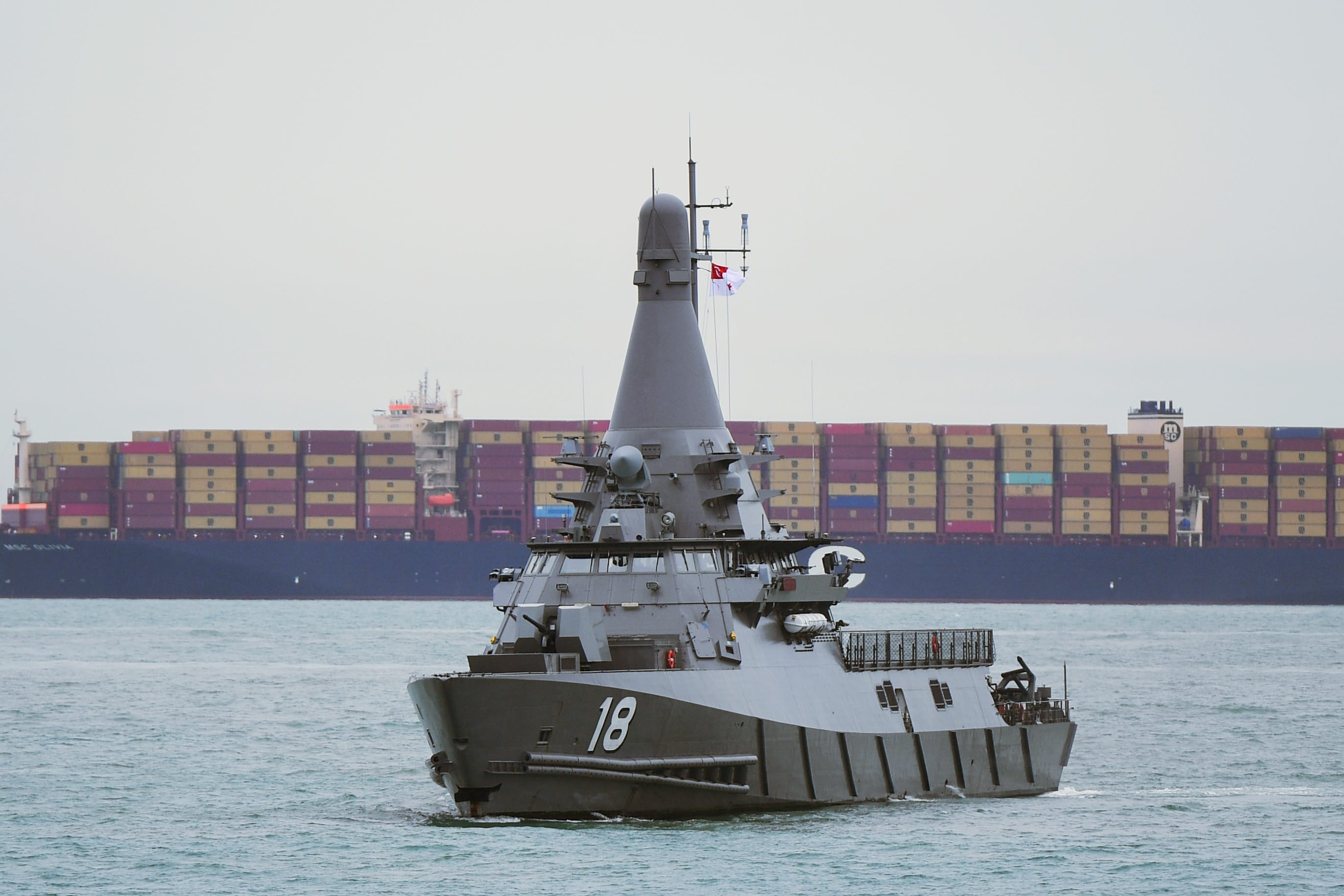 RSS Justice approaching the simulated terrorist vessel during the live demonstration.